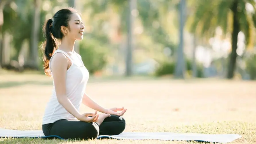 Should I "do yoga" when I'm in a bad mood? Research confirms that hot yoga classes twice a week can reduce depression by 50%